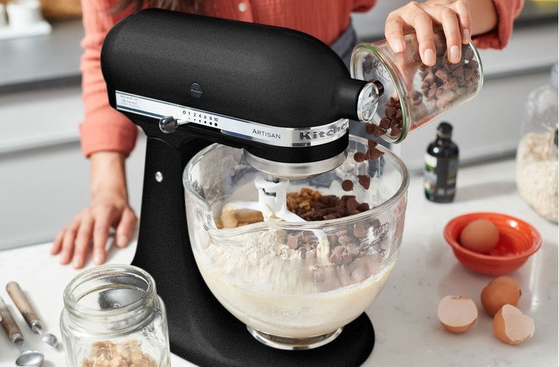 Why is a stand mixer necessary in the kitchen?